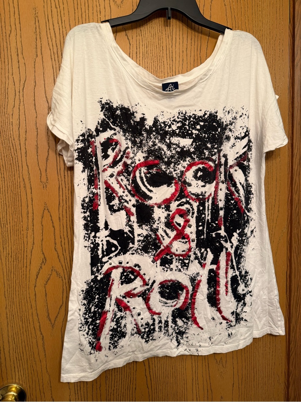 Authentic Icon short sleeved top size Large. Says Rock & Roll on the front